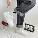 Classic all-white low-top sneakers