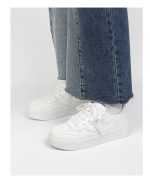Classic all-white low-top sneakers - Image 6